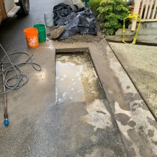 Clearset repair and excavation context for a leaking water main job.